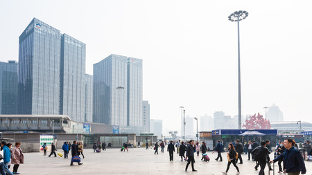 BEIJING, CHINA - MARCH 19, 2017: tourists on square of Beijing West Railway Station Road in morning. The terminal is it was the largest railway station in Asia with an area of 510000 sq mのeditorial素材