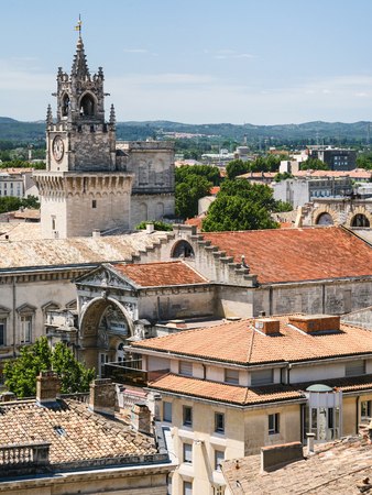 Travel to Provence, France - skyline of medieval Avignon city with Clock Tower Of Hotel De Ville (Town Hall)の写真素材