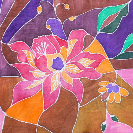 textile background - hand painted stylized flower on silk batik scarfの写真素材