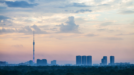 blue and pink daybreak over Moscow city with Ostankino TV Tower and Timiryazevskiy park in summer morningの写真素材