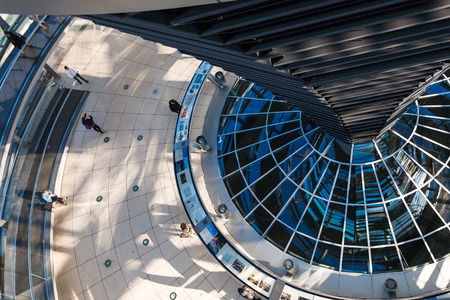 BERLIN, GERMANY - SEPTEMBER 13, 2017: tourists inside of Reichstag dome in Berlin city. Reichstag dome is a glass dome on top of Reichstag building, it was designed by architect Norman Fosterのeditorial素材