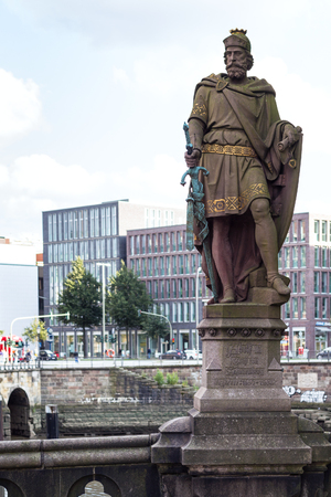 HAMBURG, GERMANY - SEPTEMBER 15, 2017: statue Count Adolf III (Graf Adolf III of Holstein, founder of new settlement for traders on riverbed of Alster near Neue Burg) on Trostbrucke in Hamburg cityのeditorial素材
