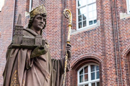 Travel to Germany - statue of statue was of St Angsar ( Archbishop Ansgar von Hamburg - Bremen, the founder of Hamburg cathedral in Old Town) on Trostbrucke bridge in Hamburg city in septemberのeditorial素材