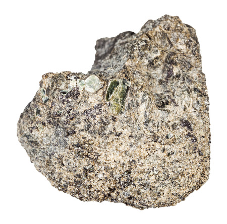 macro shooting of natural mineral rock specimen - rough peridotite stone with Phlogopite mica isolated on white background from Kovdor region, Kola Peninsula, Russiaの写真素材