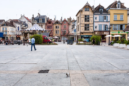 TROYES, FRANCE - JUNE 29, 2010: people, half-timbered houses, carousel on square Place Marechal Foch in Troyes city. Troyes is the capital of the Aube department in Champagne region of Northern Franceのeditorial素材