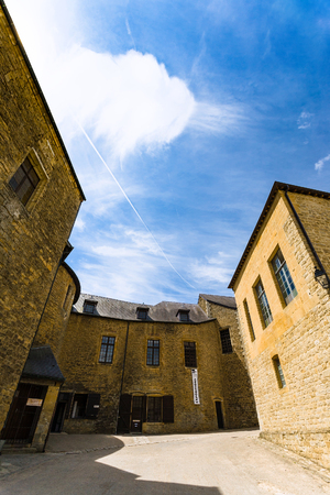 SEDAN, FRANCE - JUNE 30, 2010: entrance to gallery in castle Chateau de Sedan in summer day. Sedan is a commune in Ardennes department, the castle began to be built in 1424のeditorial素材