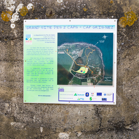 AUDINGHEN, FRANCE - JUNE 30, 2010: map of cape on the old bunker wall at the cape Cap Gris-Nez in Cote d'Opale region. The cliffs of Cap Gris-Nez are the closest point of France to England (34 km)のeditorial素材