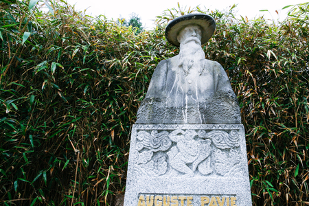 DINAN, FRANCE - JULY 5, 2010: monument of Auguste Pavie in Jardin Anglais (English garden) in Dinan town. Auguste Jean-Marie Pavie (1847-1925) was French colonial civil servant, explorer and diplomatのeditorial素材