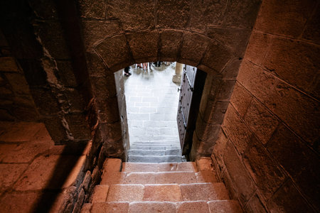 LE MONT SAINT-MICHEL - JULY 5, 2010: steps in Saint Michael's Abbey. Le Mont Saint-Michel is an...