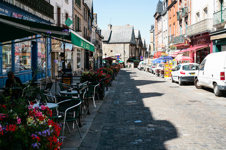 VITRE, FRANCE - JULY 7, 2010: shops and restaurants on street Rue de la Poterie in Vitre old town. Vitre is a commune in the Ille-et-Vilaine department in Brittany in northwestern Franceのeditorial素材