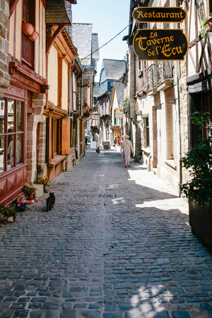 VITRE, FRANCE - JULY 7, 2010: tourists on pedestrian stone medieval street in Vitre old town. Vitre is a commune in the Ille-et-Vilaine department in Brittany in northwestern Franceのeditorial素材