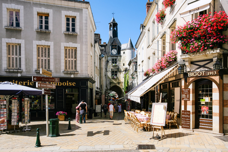 AMBOISE, FRANCE - JULY 8, 2010: people near clock tower (Tour De L'Horloge) on street Rue Nationale in Amboise town. Amboise is commune in the Indre-et-Loire department on the banks of the Loire Riverのeditorial素材