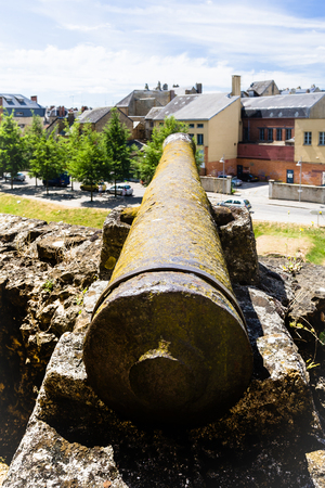SEDAN, FRANCE - JUNE 30, 2010: old cannon on rampart of castle Chateau de Sedan in summer day. Sedan is a commune in Ardennes department, the castle began to be built in 1424のeditorial素材