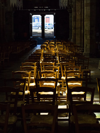 TREGUIER, FRANCE - JULY 6, 2010: many chairs in nave of Treguier Cathedral (Cathedrale Saint-Tugdual de Treguier). Building of the church was started in the 6th century and completed in the 19th centのeditorial素材
