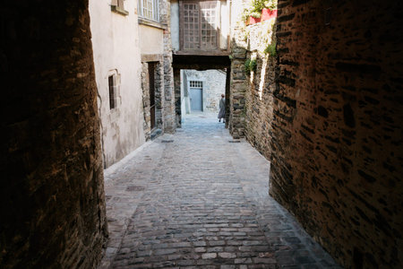 travel to France - narrow stone medieval street in Vitre old town in Ille-et-Vilaine department of...
