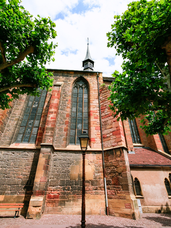 travel to France - side view of Dominican church (Eglise des Dominicains) from street Rue des Serruriers in Colmar cityの写真素材