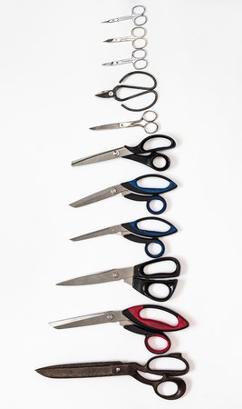 top view of column from various scissors on white backgroundの写真素材