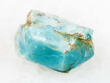 macro shooting of natural mineral rock specimen - crystal of blue apatite gemstone on white marble background from Slyudyanka district, Irkutsk region, Russiaの写真素材