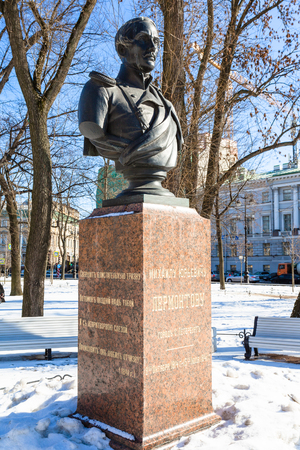 SAINT PETERSBURG, RUSSIA - MARCH 18, 2018: sculpture of Mikhail Lermontov in Alexander Garden in Saint Petersburg city in sunny March day. The bust was installed in the 1890sのeditorial素材