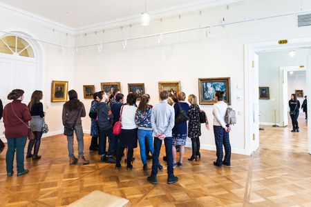 SAINT PETERSBURG, RUSSIA - MARCH 18, 2018: tourists in new Hermitage Museum in General Staff Building. The State Hermitage is second largest museum of art and culture in the worldのeditorial素材