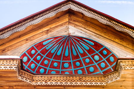 SUZDAL, RUSSIA - MARCH 10, 2018: decorated fronton of old russian wooden house in Museum of Wooden Architecture of Suzdal in Vladimir oblast of Russia in sunny day. The museum was founded in 1968のeditorial素材