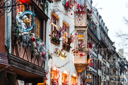 STRASBOURG, FRANCE - DECEMBER 11, 2011: festive decorated street during traditional Xmas fair in Strasbourg city. The Strassbourg Christmas market is very first Xmas market in Franceのeditorial素材