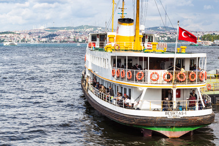ISTANBUL, TURKEY - MAY 11, 2018: people in excursion boat in Golden Horn bay in Istanbul city. Istanbul is the most populous city and the economic, cultural, and historic center in Turkeyのeditorial素材