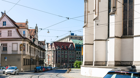 AUGSBURG, GERMANY - MAY 21, 2018: people and cars on Hoher Weg street near Cathedral in Augsburg town in sunny spring day. Augsburg is a city in Swabia, Bavaria, it is third oldest city in Germanyのeditorial素材