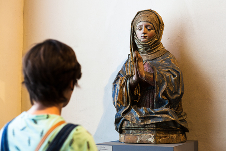 MUNICH, GERMANY - MAY 22, 2018: woman in Bavarian National Museum in Munich city. Bayerisches Nationalmuseum is decorative arts museum and one of the largest art museums in Germanyのeditorial素材