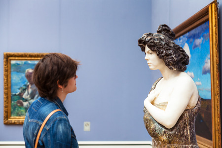 MUNICH, GERMANY - MAY 23, 2018: woman in Pinakothek der Moderne in Munich city. The New Pinakothek is art museum for modern and contemporary artのeditorial素材