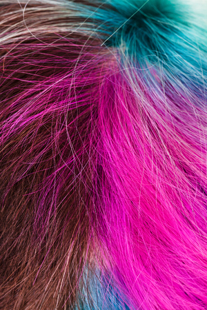 top view of female multicolored dyed hairs close upの写真素材