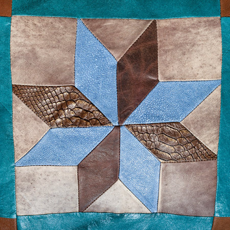 patchwork star pattern on leather decorative pillow