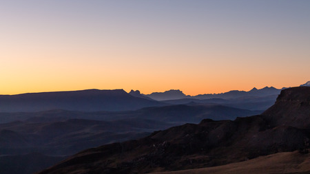 travel to North Caucasus region region - panoramic view of Caucasus Mountains from Bermamyt mountain Plateau at september dawnの写真素材