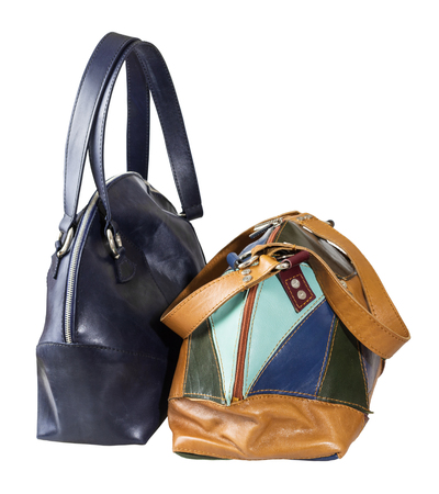 Front view of two handmade leather handbags isolated on whiteの写真素材