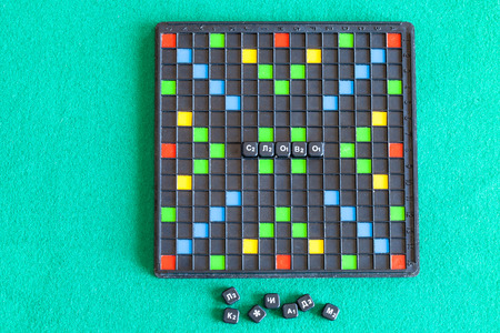 MOSCOW, RUSSIA - APRIL 3, 2019: top view of gameboard of Erudite word game on green baize table. Erudite is russian variant of Scrabble board game, it was designed about 1968 yearのeditorial素材