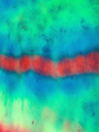 red line in multicoloured background handpainted in cold Tie-dye batik technique on silk fabricの写真素材