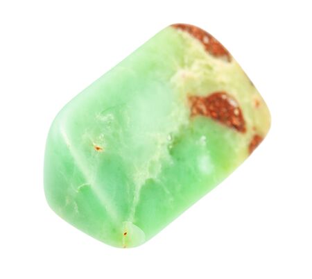 closeup of sample of natural mineral from geological collection - polished Chrysoprase gem isolated on white backgroundの写真素材