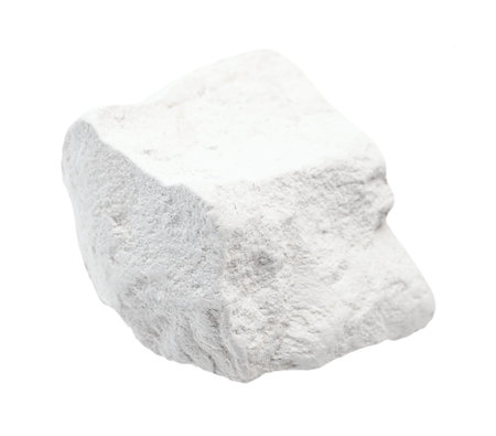 closeup of sample of natural mineral from geological collection - rough chalk (white limestone) rock...