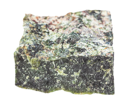 closeup of sample of natural mineral from geological collection - raw Dunite rock isolated on white...