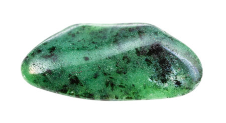 closeup of sample of natural mineral from geological collection - polished green Zoisite gemstone...