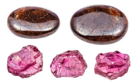 set of various pyrope garnet gemstones isolated on white background