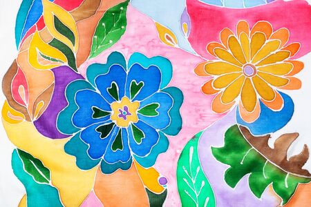fragment of floral pattern hand-drawn on silk scarf in cold contour batik techniqueの写真素材
