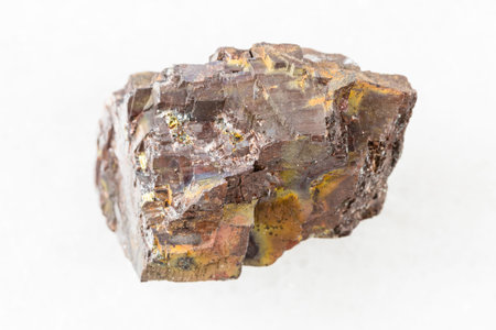 closeup of sample of natural mineral from geological collection - raw Siderite rock on white marble background from Cordoba, Andalusia, Spainの写真素材