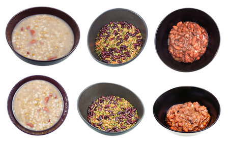 set of beans dishes in black bowls isolated on white backgroundの写真素材