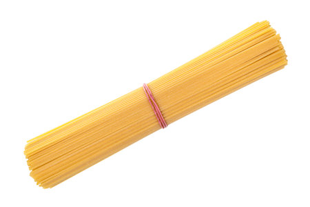 bunch of italian dried spaghetti isolated on white backgroundの写真素材