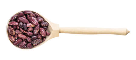 top view of wood spoon with red spotted pinto beans isolated on white backgroundの写真素材