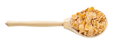 wooden spoon with sugar coated cornflakes isolated on white backgroundの写真素材