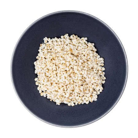 top view of cooked porridge from polished Sorghum groats in gray bowl isolated on white backgrounの写真素材