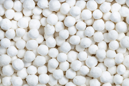 food background - many raw tapioca pearls close up