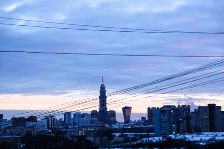 dark blue clouds over residential district in Moscow city at dusk